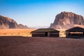 Red sand desert and Bedouin camp at sunny summer day in Wadi Rum, Jordan. Middle East Royalty Free Stock Photo