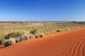 Red sand dune on a clear day, Northern Territory, Australia Royalty Free Stock Photo