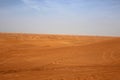 Red Sand Dunes in Sharjah, UAE during a Sunny Day Royalty Free Stock Photo