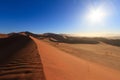 Red sand dunes at sunrise Royalty Free Stock Photo