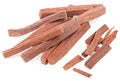 Red sandalwood sticks and chips isolated on white background. Santali rubri. Chandan or sandalwood Royalty Free Stock Photo