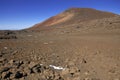 Red sands of Mauna Kea volcano with snow, Hawaii