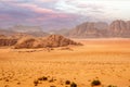 Red sands mountains, dramatic sky and marthian landscape panorama of Wadi Rum desert, Jordan Royalty Free Stock Photo