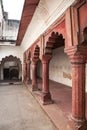 Red sandstone arches of the inner courtyard of Agra Red Fort