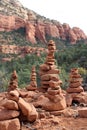 Red sandstone cairns of differing heights on the Devil\'s Bridge Trail in Sedona, Arizona