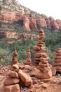 Red sandstone cairns of differing heights on the Devil\'s Bridge Trail in Sedona, Arizona