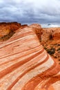 Red sandstone rock formation Fire Wave inside Valley of Fire State Park portrait format in Nevada in the United States Royalty Free Stock Photo