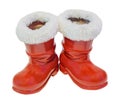 Red Santa Claus boots, shoes. Saint Nicholas boots gifts,white background. Royalty Free Stock Photo