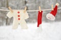 Red santa claus clothes drying Royalty Free Stock Photo