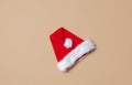 Red Santa Claus hat on stark white background