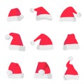 Red Santa Claus hats isolated on colorful background. Symbol of Christmas holiday. Vector santa hat set. Royalty Free Stock Photo