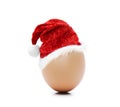 Red Santa Hat on an Easter Egg Royalty Free Stock Photo