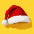 Red Santa Hat Icon on Yellow Background Royalty Free Stock Photo