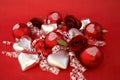 Red satin balls, silver hearts with roses and ribb