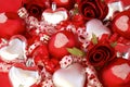 Red satin balls, silver hearts with roses and ribb Royalty Free Stock Photo