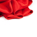 Red satin fabric against white background Royalty Free Stock Photo