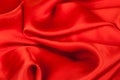 Red satin fabric against white background Royalty Free Stock Photo