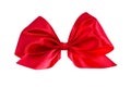Red satin gift bow. Ribbon. Isolated on white. Royalty Free Stock Photo