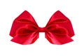 Red satin gift bow. Ribbon. Isolated on white. Royalty Free Stock Photo