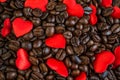 Red satin hearts on coffee beans, valentines or mothers day background, love celebrating