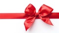 red satin ribbon and bow isolated on white background. Generative Ai Royalty Free Stock Photo