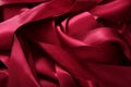 Red satin ribbons in a messy mess texture Royalty Free Stock Photo