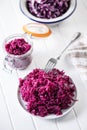 Red sauerkraut. Sour pickled cabbage on plate Royalty Free Stock Photo