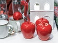 Red scented candles in the form of apples. Christmas decor
