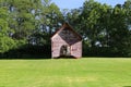 Red school house abandoned empty rural schoolhouse building historic old vintage prairie countryside home Royalty Free Stock Photo