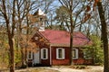 Red School House in the Woods Royalty Free Stock Photo