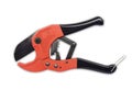 Red scissors for cutting plastic pipe Royalty Free Stock Photo