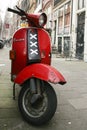 Red scooter in Amsterdam - The Netherlands Royalty Free Stock Photo