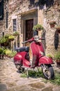 Red scooter in Tuscany