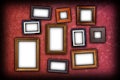 Red scratched wall with frames Royalty Free Stock Photo