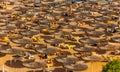 Red sea beach from aerial top view. Tourists relaxing under umbrellas Royalty Free Stock Photo