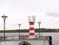 Red sea white lighthouse, seagulls sitting on a lighthouse Royalty Free Stock Photo