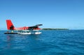 A seaplane of Maldivian Air Taxi is landed on the beautiful sea.