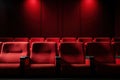 Red seats in cinema or theatre interior. Empty movie theater. Copy space. Generative Ai Royalty Free Stock Photo