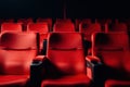 Red seats in cinema or theatre interior. Empty movie theater. Copy space. Generative Ai Royalty Free Stock Photo