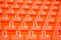 Red seats on stadium steps bleacher Royalty Free Stock Photo