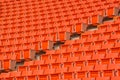 Red seats on stadium steps bleacher Royalty Free Stock Photo