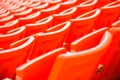 Red seats on stadium steps bleacher Royalty Free Stock Photo