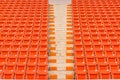 Red seats on stadium steps bleacher Royalty Free Stock Photo