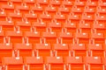 Red seats on stadium steps bleacher Royalty Free Stock Photo