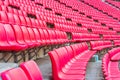 Red seats on stadium steps bleacher Royalty Free Stock Photo