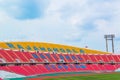 Red seats on stadium steps bleacher