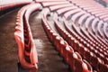 Red seats in unrecgonizable sports stadium Royalty Free Stock Photo