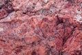 Red sedimentary rock texture background. Royalty Free Stock Photo