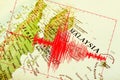 Red seismic wave over Malaysia map