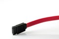 Red Serial-ATA cable on white background Royalty Free Stock Photo